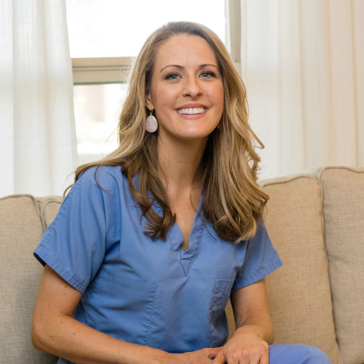 LCarmichael vet sitting and smiling inside