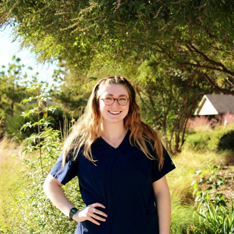 Amy Prichard - Technician woman standing outside and smiling