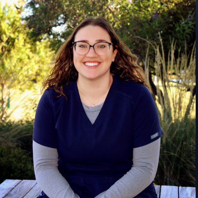 Liz - Technician women sitting outside