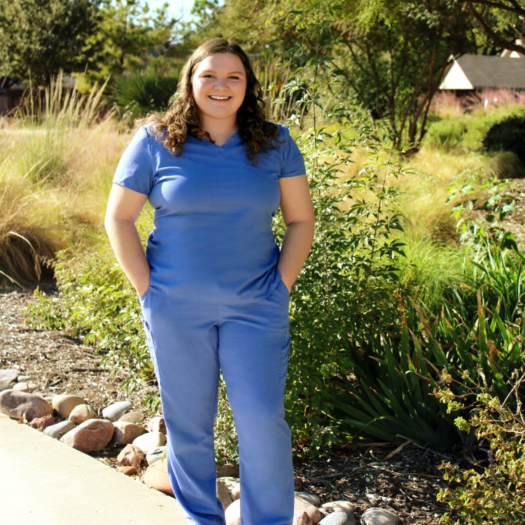 Madison - Technician women standing outside and smiling